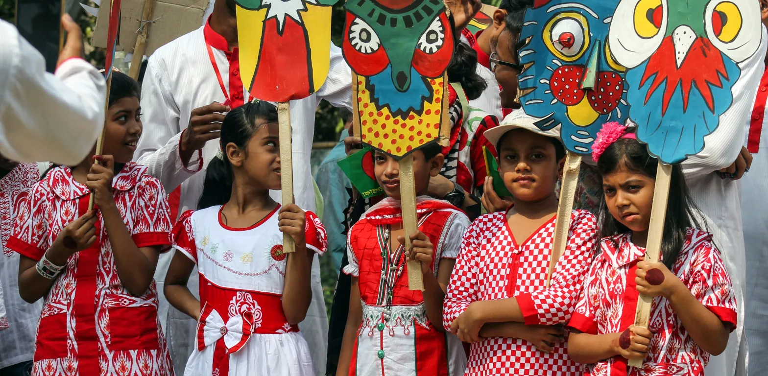 Bangladeshi_children_with_Pohela_Boishakh_placard_at_Pohela_Boishakh_celebration_(02)